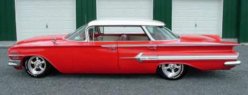 1960 Impala in red with torque thrusts